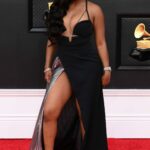 Dreezy Flaunts Her Curves in a Black Dress at the 64th Annual Grammy Awards (2 Photos)