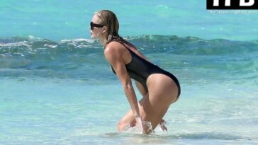 Khloe Kardashian Show Off Her Incredible Figure in a Black Bikini While in Turks and Caicos (11 Photos)
