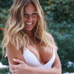 Kelly Bensimon Flashes Her Nude Boob Posing in a White Bikini (7 Photos)