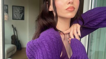 Dove Cameron Poses in a Purple Top for Her Followers (9 Photos)
